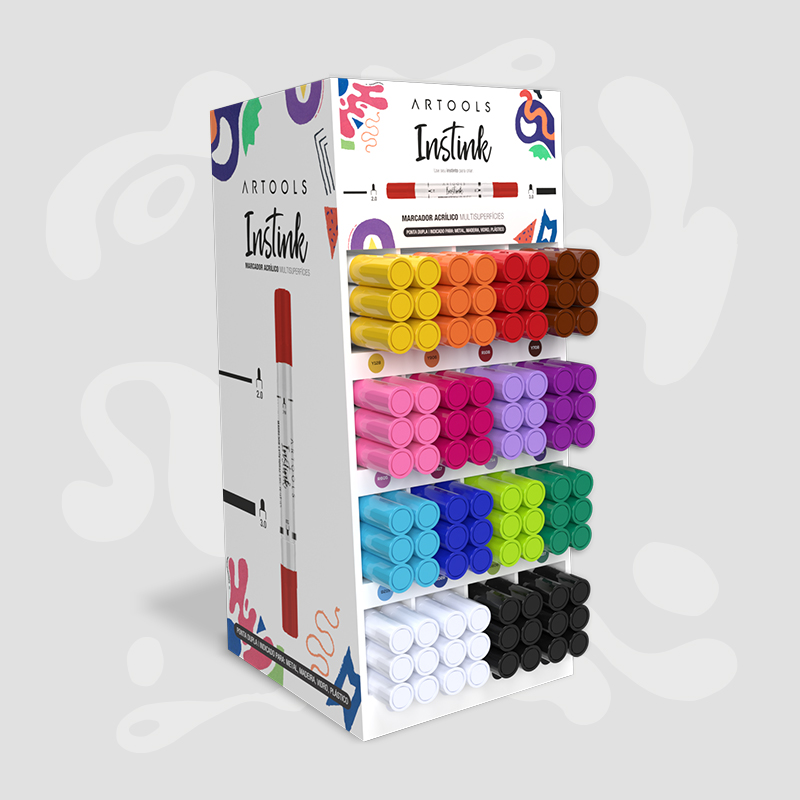 A white retail floor display holding rows of ARTTOOLS Instink acrylic multipurpose markers in approximately 12 colors, including yellow, orange, red, brown, pink, purple, blue, green, black, and white. The display features colorful abstract graphics and a large illustration of a red marker on the side panel.